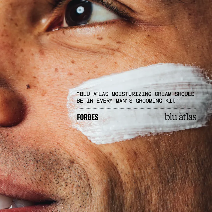 Blu Atlas ad quoting Forbes: Blu Atlas moisturizing cream should be in every man’s grooming kit, over a close-up of a swipe of cream on a man’s cheek