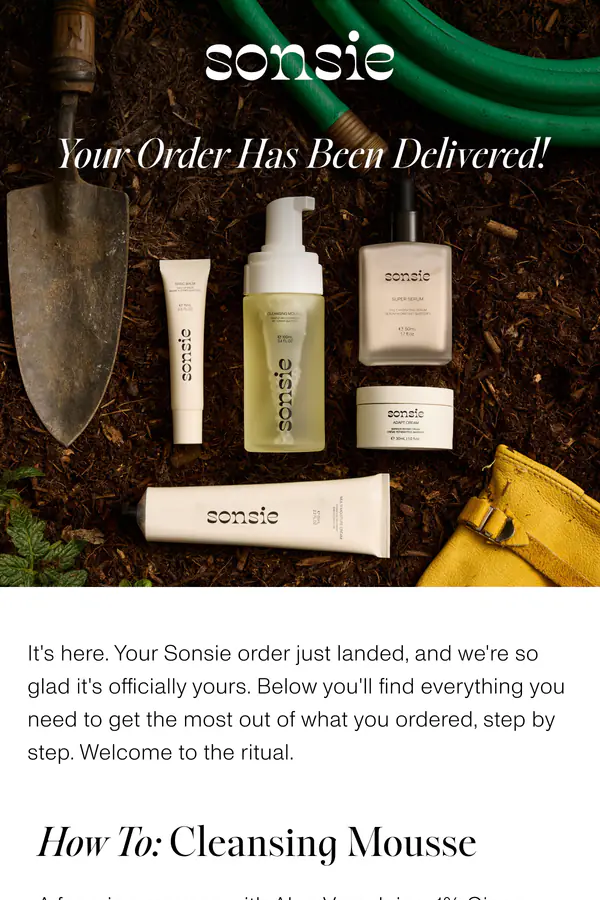 Sonsie email sent when an order is delivered: "Your Order Has Been Delivered!" over the skincare lineup in a garden, then step-by-step how-to guides for the Cleansing Mousse and Super Serum with product and model photos.