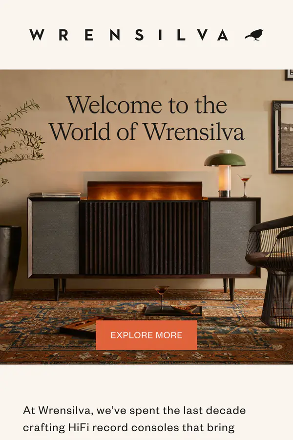 Wrensilva welcome email: "Welcome to the World of Wrensilva" over a walnut record console in a living room, a short letter about the brand, tiles for the M1, The Standard, and Studio consoles, and a quote from Grammy-winning producer Giles Martin.